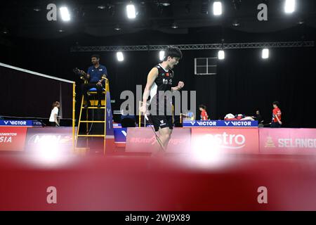 Shah Alam, Malaisie. 14 février 2024. Wang Zhiyi de Chine célèbre lors du match féminin en simple contre Ashmita Chaliha de l'Inde lors de la phase de groupes par équipe féminine entre la Chine et l'Inde aux championnats d'Asie par équipe de Badminton 2024 à Shah Alam, Selangor, Malaisie, le 14 février 2024. Crédit : Chong Voon Chung/Xinhua/Alamy Live News Banque D'Images