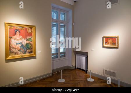 L : Portrait de Madame Colonna Romano. R : Coco Reading, tous deux de Pierre Auguste Renoir ; peinture exposée dans son ancienne maison de Cagnes-sur-mer. France. (135) Banque D'Images