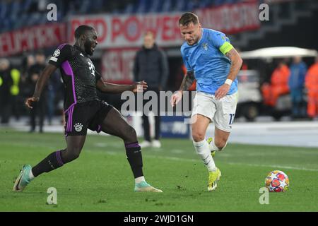 Rome, Italie, 14 février 2024 Ciro immobile du SS Lazio concourt pour le ballon avec Dayot Upamecano du FC Bayern Munchen lors du match de Ligue des champions de l'UEFA entre le SS Lazio et le FC Bayern Munchen crédit:Agostino Gemito/ Alamy Live News Banque D'Images