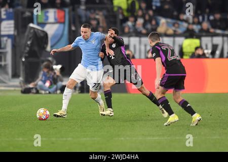 Rome, Italie. 14 février 2024. Adam Marusic du SS Lazio et Jamal Musiala du Bayern Munchen lors du match de football de la Ligue des Champions entre le SS Lazio et le FC Bayern Munchen au stade Olimpico à Rome (Italie), le 14 février 2024. Crédit : Insidefoto di andrea staccioli/Alamy Live News Banque D'Images