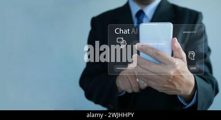 Concept de chat ai. Homme d'affaires discute avec l'IA sur un smartphone. Chatter avec une intelligence artificielle intelligente, une application de service chatbot client, usi Banque D'Images