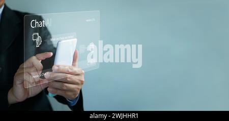 Concept de chat ai. Homme d'affaires discute avec l'IA sur un smartphone. Chatter avec une intelligence artificielle intelligente, une application de service chatbot client, usi Banque D'Images