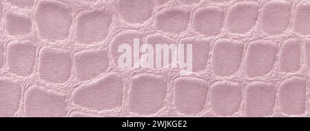 Fond rose clair à partir d'un revêtement souple, en matières textiles, libre. Tissu rose avec motif imitant la peau de crocodile.. Fond texturé. Banque D'Images
