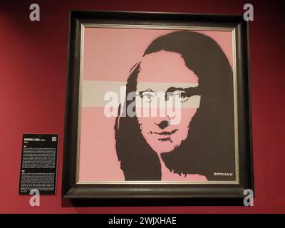 Œuvre „Mona Lisa (Rose)“ de Banksy dans l’exposition „le mystère de Banksy – Un esprit de génie“ au Technikum Mülheim le 18 novembre 2022 Banque D'Images