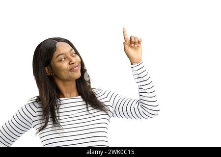 Femme, sur fond blanc, gros plan, pointant vers le haut Banque D'Images