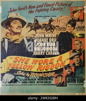 JOHN WAYNE JOANNE DRU JOHN AGAR HARRY CAREY JR. BEN JOHNSON GEORGE O'BRIEN et VICTOR McLAGLEN dans ELLE PORTAIT Un RUBAN JAUNE 1949 réalisateur JOHN FORD Story James Warner Bellah scénario Frank S. Nugent et Laurence Stallings producteurs exécutifs Merian C. Cooper et John Ford Argosy Pictures / RKO Radio Pictures Banque D'Images