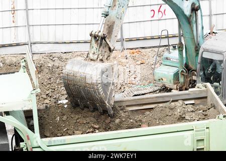 Creuser le sol de l'excavateur Banque D'Images