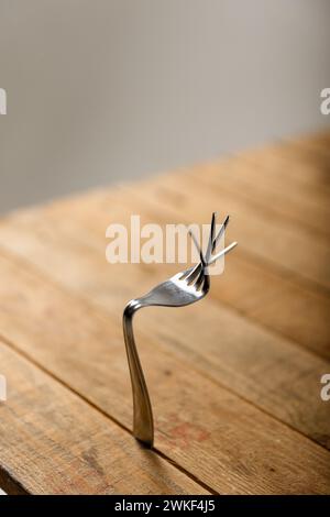 Art of Fork Bending, How to Bend Forks with Your Mind Banque D'Images