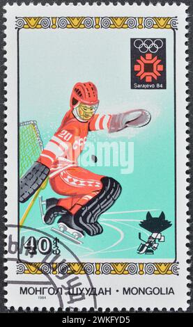 Timbre-poste oblitéré imprimé par la Mongolie, qui montre Hockey, Jeux Olympiques d'hiver 1984 - Sarajevo, vers 1984. Banque D'Images