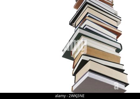 Pile de nombreux livres différents isolés sur blanc, vue en angle bas Banque D'Images