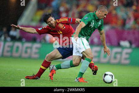 v.l. : Xabi Alonso ( ESP ), Jon Walters ( IRL ) Fussball EM 2012 Gruppe C : Espagnol - Irland UEFA EURO 2012 Group C : Espagne - République d'Irlande 14.6.2012 PGE Arena Danzig © diebilderwelt / Alamy Stock Banque D'Images