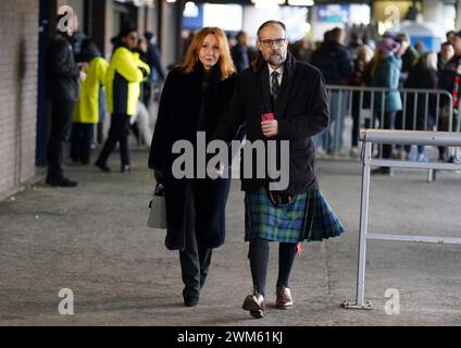 J. K. Rowling et Neil Murray arrivent pour le Guinness six Nations match au Scottish Gas Murrayfield Stadium, à Édimbourg. Date de la photo : samedi 24 février 2024. Banque D'Images