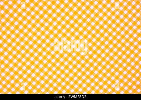Motif tissu jaune rayé et plaid. Texture de motif de fond écossais. Banque D'Images