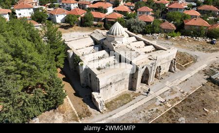 Susuz Caravansérail Anatolian Seldjouk période, a été construit au 13ème siècle. Il est situé dans les limites du village de Susuz, à 10 km de Bucak distric Banque D'Images