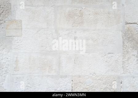 Texture du mur de la vieille maison. Maçonnerie de brique blanche. Fond beige pour la conception Banque D'Images