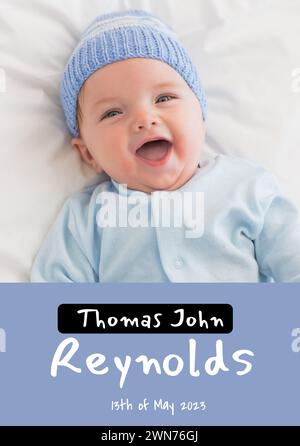 Composition du texte de thomas john reynolds avec date de naissance sur bébé caucasien sur fond bleu Banque D'Images