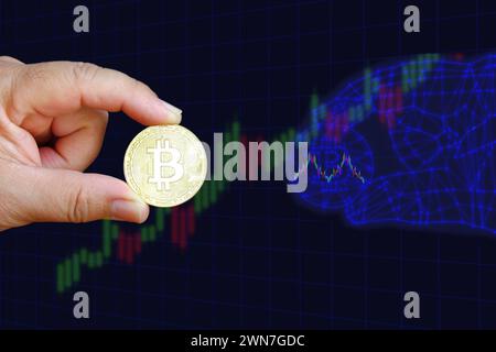 main tenant la pièce de monnaie de bit avec illustration modèle de main de ligne polygonale, concept de bande de roulement de pièce de bit Banque D'Images