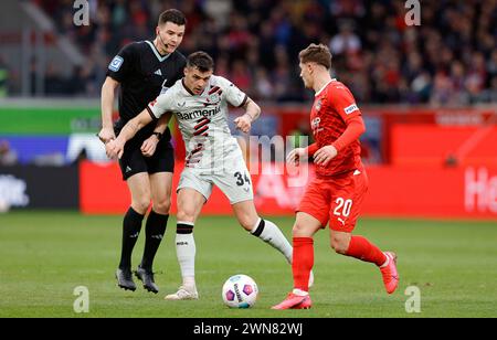 Heidenheim, Allemagne. 17 février 2024. firo : 17/02/2024, football, football, 1ère ligue, 1ère Bundesliga, saison 2023/2024, 22e journée 1.FC Heidenheim - Bayer 04 Leverkusen 1:2, granit Xhaka, Bayer 04 Leverkusen, Bayer 04, Leverkusen, Bavarian, chiffre entier, crédit : dpa/Alamy Live News Banque D'Images