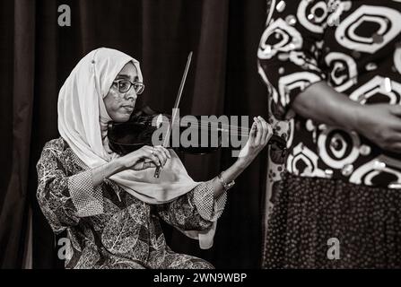 Les musiciens jouent de la musique Taarab, concert de la Dhow Countries Music Academy (DCMA), Stone Town, Zanzibar, Tanzanie Banque D'Images