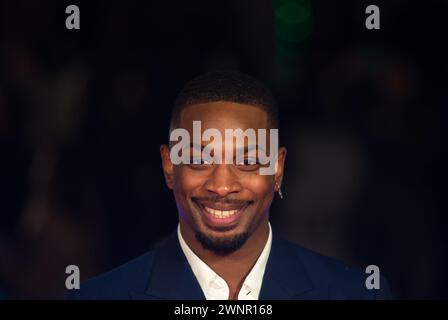 Malaga, Espagne. 04 mars 2024. L’acteur espagnol Moussa Sylla pose sur le tapis rouge lors du Festival du film de Malaga. La nouvelle édition du 27ème Festival du film espagnol de Malaga, un grand événement cinématographique présente les candidats au film pour remporter le prix 'Biznaga de Oro'. Le festival se tiendra du 1er au 10 mars. (Photo de Jesus Merida/SOPA images/SIPA USA) crédit : SIPA USA/Alamy Live News Banque D'Images