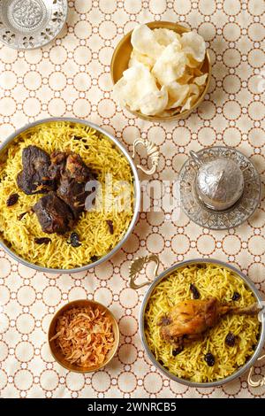 Mouton biryani poulet biryani épicé indien Malabar biryani Hyderabadi Biryani, Dum Biriyani Pulao Kerala Inde Sri Lanka Pakistan riz Basmati. Ramad Banque D'Images