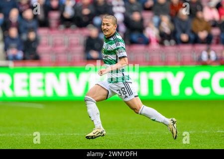 Daizen Maeda du Celtic, joueur japonais en action lors du Cinch Scottish Premiership match entre Heart of Midlothian et Celtic au Tynecastle Park, à Édimbourg, en Écosse, le 3 mars 2024. Banque D'Images