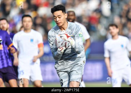 Tianjin Jinmen Tiger Football Club 1-1 dessine le Nantong Zhiyun Football Club au premier tour de la Super League chinoise (CSL) 2024 à Tianjin, en Chine, Banque D'Images