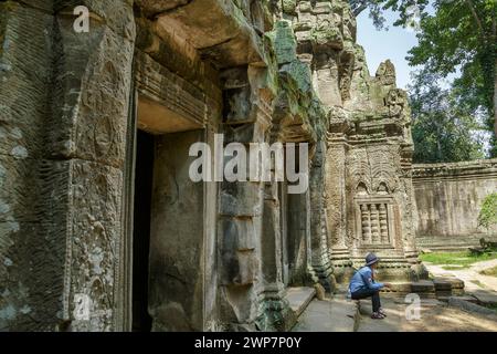 Vue latérale de Ta Prohm à l'intérieur d'Angkor Wat, Siem Reap, Cambodge Banque D'Images