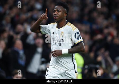 Madrid, Espagne. 11 mars 2024. Vinicius Junior du Real Madrid célèbre le but lors du match de football de la ligue espagnole (la Liga) entre le Real Madrid et le Celta de Vigo à Madrid, en Espagne, le 11 mars 2024. Crédit : Gustavo Valiente/Xinhua/Alamy Live News Banque D'Images