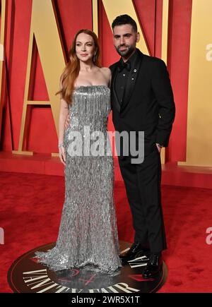 Beverly Hills, États-Unis. 10 mars 2024. Lindsay Lohan et Bader Shammas arrivant à la Vanity Fair Oscar Party tenue au Wallis Annenberg Center for the Performing Arts le 10 mars 2024 à Beverly Hills, CA. © OConnor-Arroyo/AFF-USA.com crédit : AFF/Alamy Live News Banque D'Images