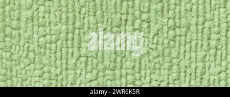 Arrière-plan de moelleux vert clair, doux tissu laineux. La texture de gros plan textile. Banque D'Images