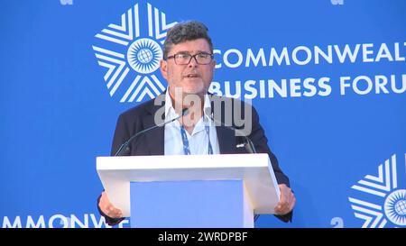 Capture d'écran tirée de la chaîne YouTube CHOGM 2022 de Frank Hester OBE prenant la parole lors d'un événement du Commonwealth Business Forum à Kigali, Rwanda. Date d'émission : mardi 12 mars 2024. Banque D'Images