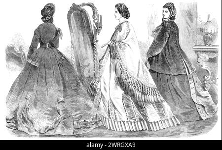 Paris mode pour décembre 1864. Fig. 1. Robe de marche. Robe popeline grise, garnie sur le corps et jupe avec velours dentelé noir et longue frange chenille... le corsage est &#xe0 ; basques, et ouvert devant ainsi que derrière. La ceinture, placée en dessous, est attachée par deux boucles, l'une à l'avant et l'autre à l'arrière de la taille. Bonnet en velours de couleur rose, orné de fleurs sur un seul côté ; le coquillage forme à la fois la couronne et le bavolet. Fig. 2. Robe de balle. Robe de tulle blanc sur jupe en satin ornée d'un volant ruché profond. La sortie de bal (to whic Banque D'Images