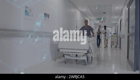 Image d'un réseau d'icônes médicales et de traitement de données sur divers médecins dans l'hôpital Banque D'Images