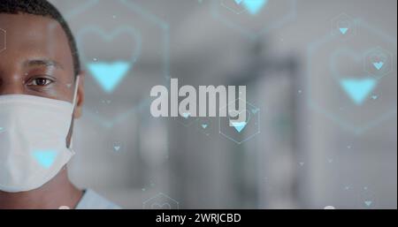 Image d'un réseau d'icônes médicales et de traitement de données sur médecin afro-américain Banque D'Images