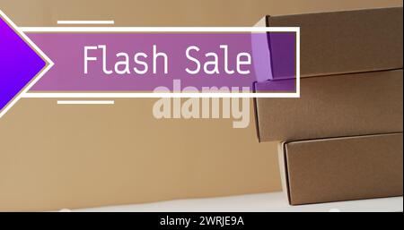 Image d'un texte de vente flash sur des boîtes cadeaux Banque D'Images