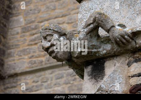 Une gargouille sur l'église All Saints, Buckworth, Cambridgeshire, Angleterre, Royaume-Uni Banque D'Images