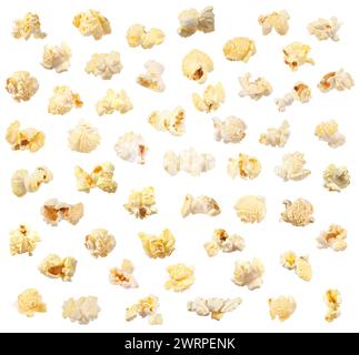 Savoureux pop-corn. Beaucoup de cerneaux éclatés isolés sur blanc Banque D'Images