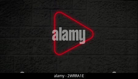 Image d'un signe de néon rouge pouces vers le bas sur le mur de briques 4k Banque D'Images