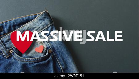 Image de texte de vente massive sur fond de pantalon denim Banque D'Images