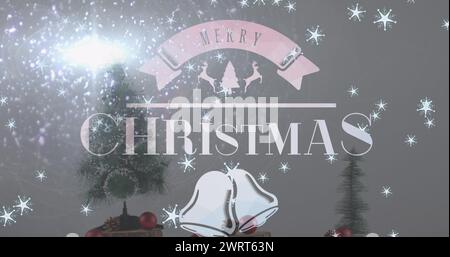 Image du texte de voeux de noël sur l'arbre de noël et les décorations Banque D'Images
