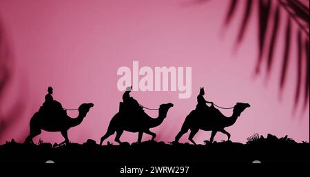Image des hommes sages de noël sur des chameaux sur fond rose Banque D'Images