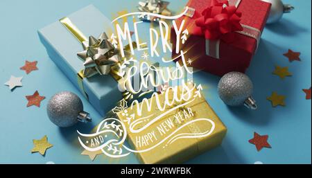 Image du texte joyeux noël sur les cadeaux Banque D'Images