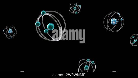 Image de modèles atomiques tournant sur fond noir Banque D'Images