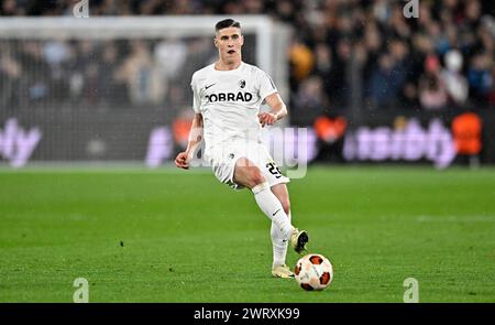 Londres, Royaume-Uni. 14 mars 2024. Roland Sallai (Freiburg) lors du match West Ham vs SC Freiburg UEFA Europa League, 16e, 2e match aller, au London Stadium, Stratford. Cette image est RÉSERVÉE à UN USAGE ÉDITORIAL. Licence exigée du Football DataCo pour toute autre utilisation. Crédit : MARTIN DALTON/Alamy Live News Banque D'Images
