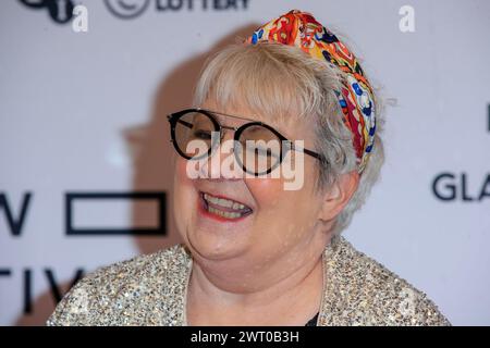 Glasgow, Écosse, Royaume-Uni. 10 mars 2024. La comédienne Janey Godley, sur le tapis rouge lors d'une séance photo pour la première mondiale de Janey, au Glasgow film Theatre (GFT), en Écosse. Janey est « un documentaire honnête, émouvant et souvent hilarant sur [elle], entrelacant des histoires de sa vie, avec des images de sa tournée Not Dead Yet, à la suite de son diagnostic de cancer ». Le Glasgow film Festival 2024 (GFF) se termine ce soir. Crédit : Stewart Kirby pour @creativezealots / Alamy Live News Banque D'Images