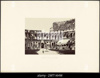 Intérieur du Colisée, Rome. Giorgio Sommer, photographe (italien, né en Allemagne, 1834 - 1914) 1867–1874 homme célibataire debout au centre du Colisée. Il y a un petit auvent blanc s'étendant du niveau inférieur du mur du stade à la droite de l'homme. Un clocher est partiellement visible derrière l'homme, à l'extérieur du Colisée. (Recto, monture) centre inférieur, typographie noire : 'INTÉRIEUR DU COLISÉE [sic], ROME.' ; en bas à droite, crayon : '20' ; (verso, monture) en haut à gauche, crayon : 'Inv #731155' ; en bas à droite, crayon : 'MacPherson 25 / 18'; Banque D'Images