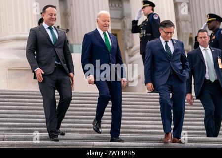 Washington, États-Unis. 15 mars 2024. Le Taoiseach irlandais Leo Varadkar (de gauche à droite), le président américain Joe Biden et le président de la Chambre Mike Johnson (R-LA) quittent le Capitole après le déjeuner des amis de l'Irlande avec le Taoiseach irlandais Leo Varadkar à Washington DC le vendredi 15 mars 2024. Photo de Nathan Howard/UPI crédit : UPI/Alamy Live News Banque D'Images