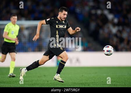 Victor Chust de Cadix CF avec le ballon lors du match LaLiga EA Sports entre Real Sociedad et Cadix CF au stade Reale Arena le 15 mars 2024, à Saint-Sébastien, Espagne. Crédit : Cesar Ortiz Gonzalez/Alamy Live News Banque D'Images