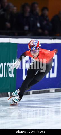 Rotterdam, pays-Bas. 16 mars 2024. Sun long, de Chine, participe à la finale masculine du 1500 m A aux Championnats du monde de patinage de vitesse sur courte piste 2024 de l'ISU à Rotterdam, pays-Bas, le 16 mars 2024. Crédit : Lian Yi/Xinhua/Alamy Live News Banque D'Images